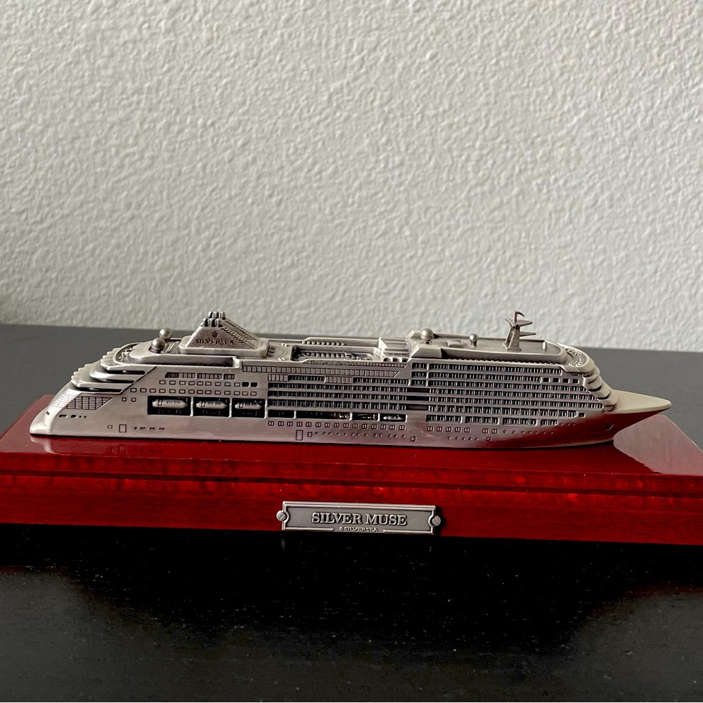 Silver Cruise Ship Model on Red Base